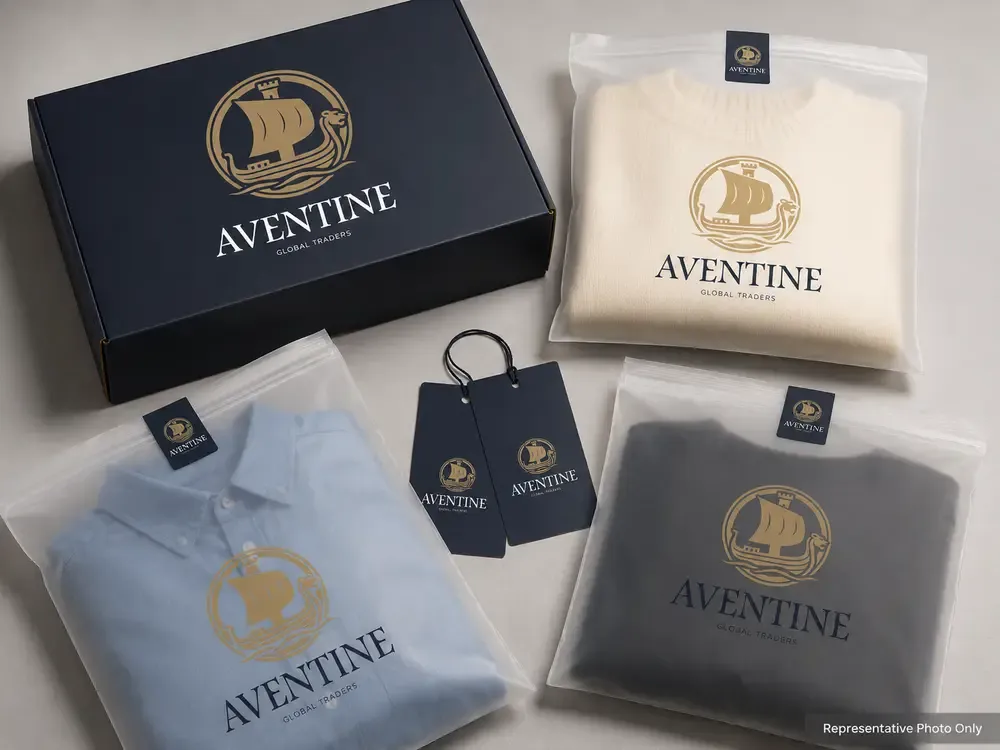 Folded garments in branded apparel bags with a hang tag